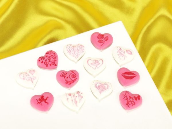 Herzen mit Motiven weiß-rosa Zucker 96 Stück