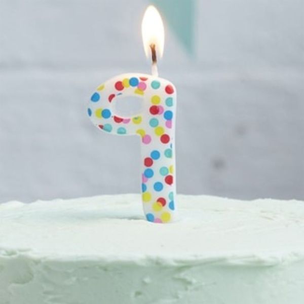 Birthday candle, number 9, confetti
